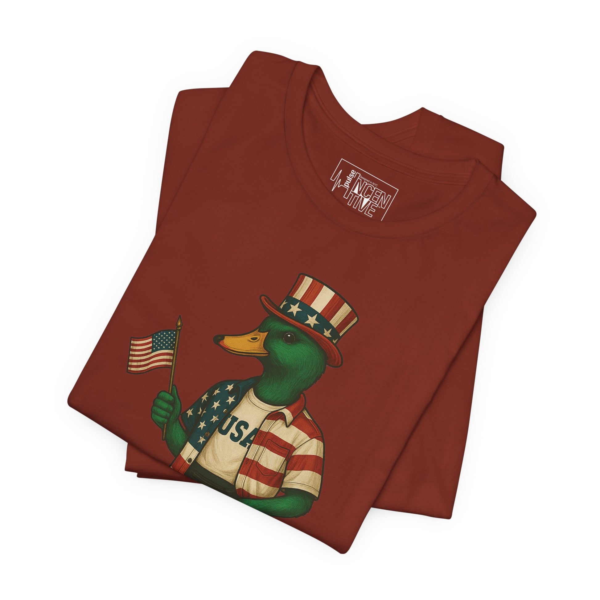 Rust Red USA Duck T-shirt folded view with anthropomorphic mallard duck graphic